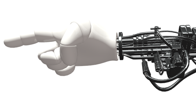 a white robot handing pointing to the left